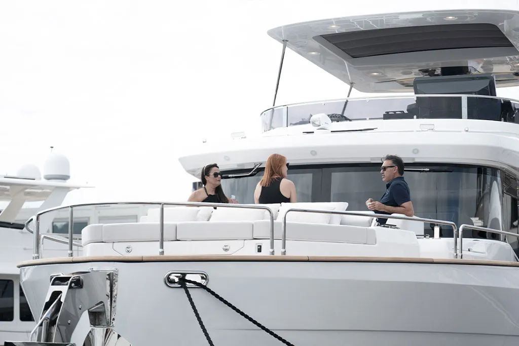 Visitors touring the flybridge of a Sirena yacht at the Cannes Yachting Festival