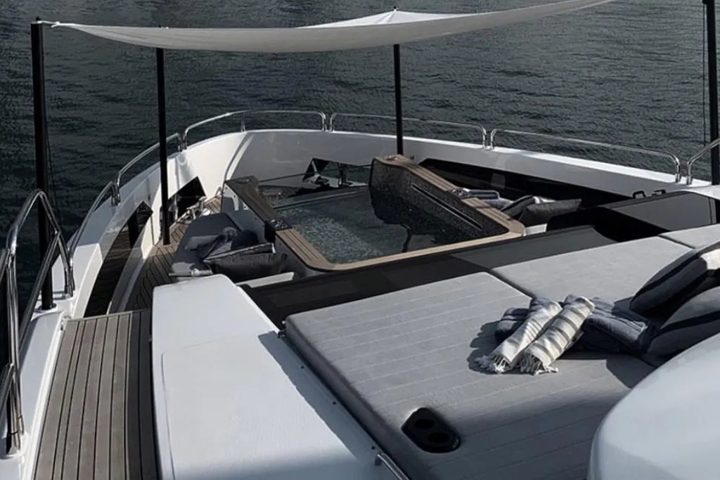 Shaded foredeck lounge of a Sirena yacht at the Dubai International Boat Show
